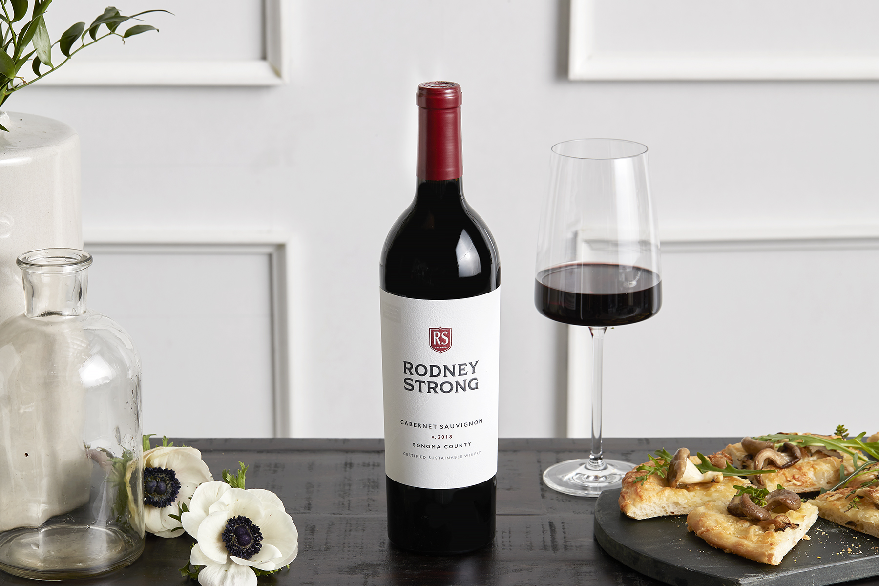 Rodney Strong Cabernet Sauvignon bottle and glass with pizza