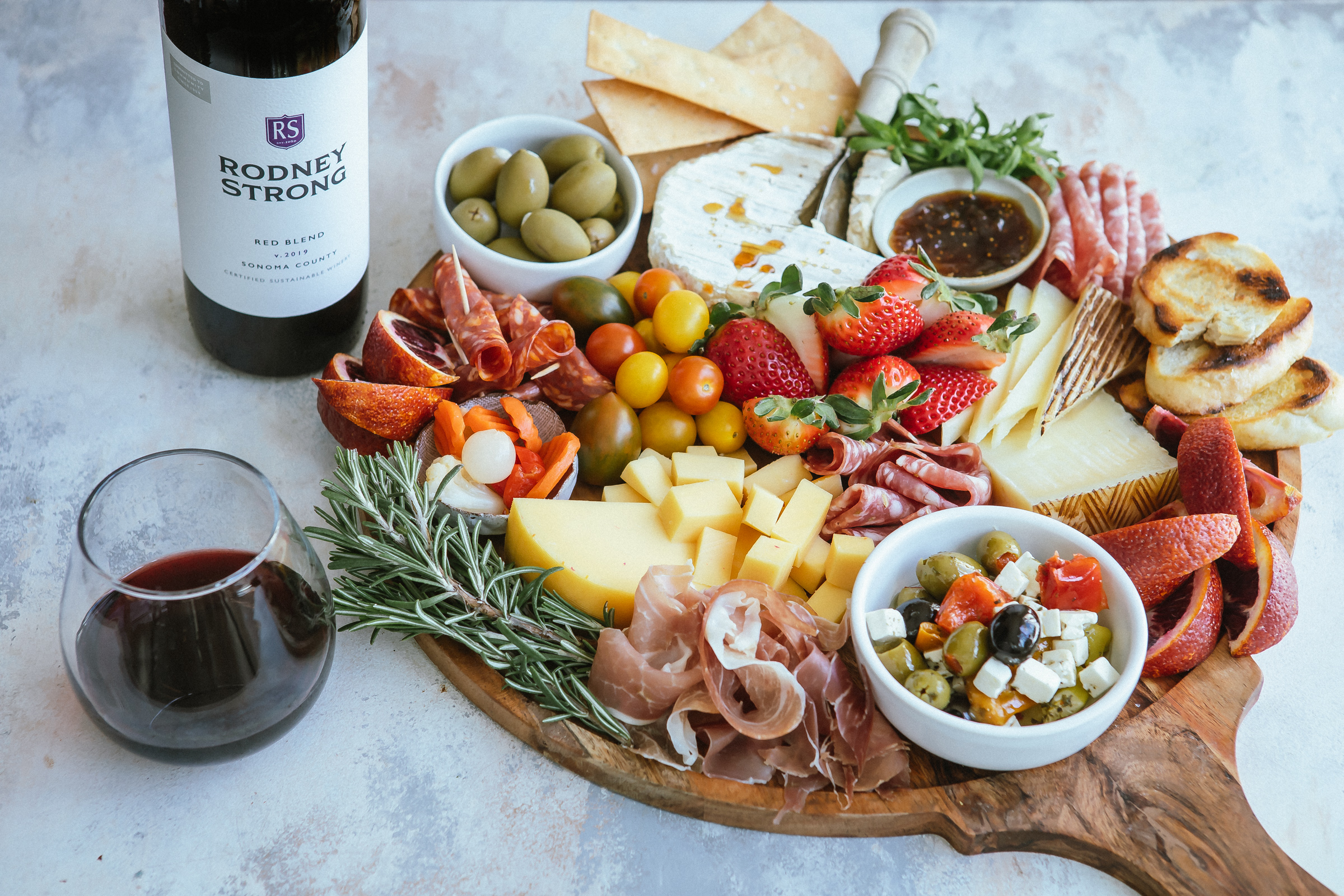 Charcuterie board with RS Red blend