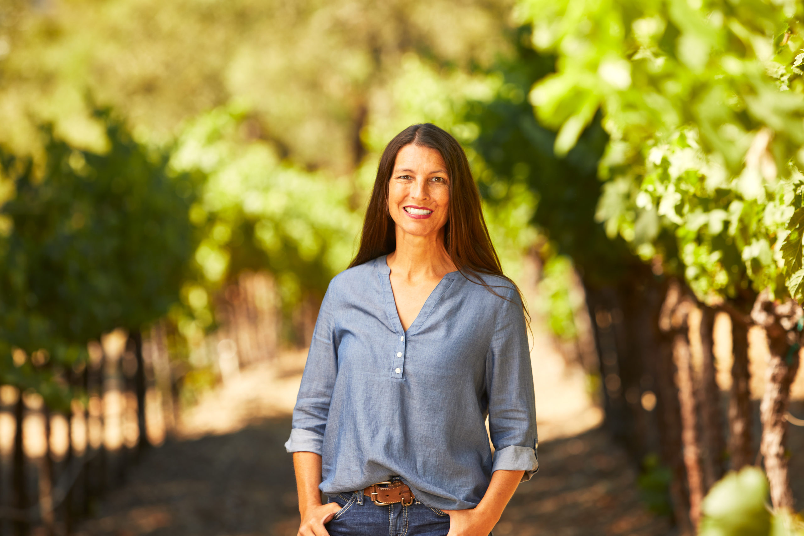 Allison Dericco in vineyard