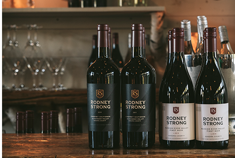 Bottles of Rodney Strong red wine on wooden counter