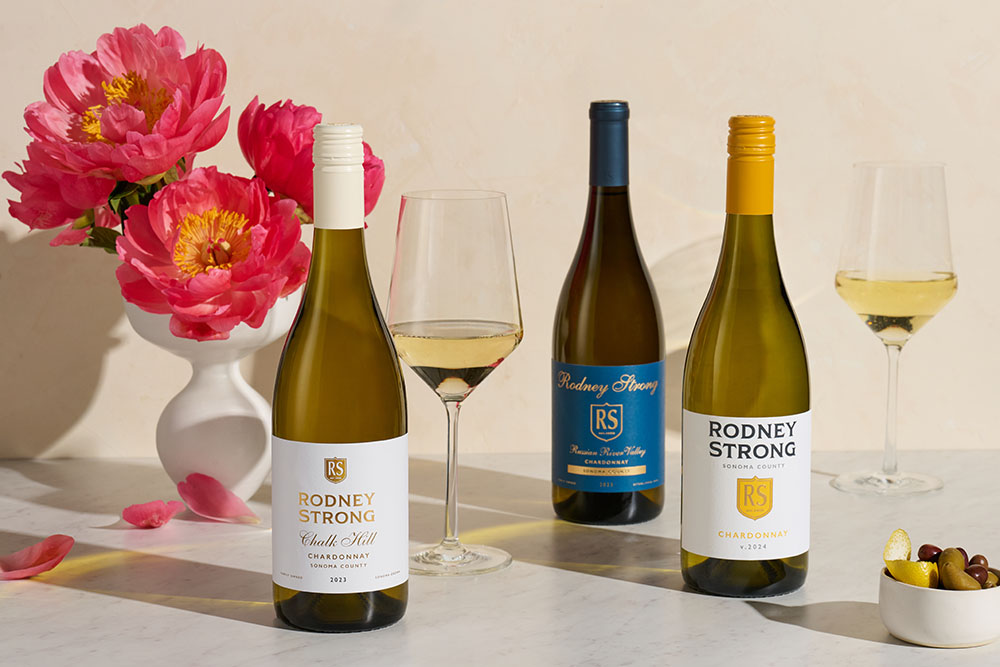 Core Chardonnays on a table with flowers