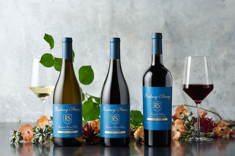 Limited Tier Wines on a table with leaves and flowers