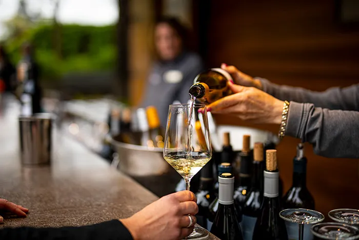 Wine being poured into a glass
