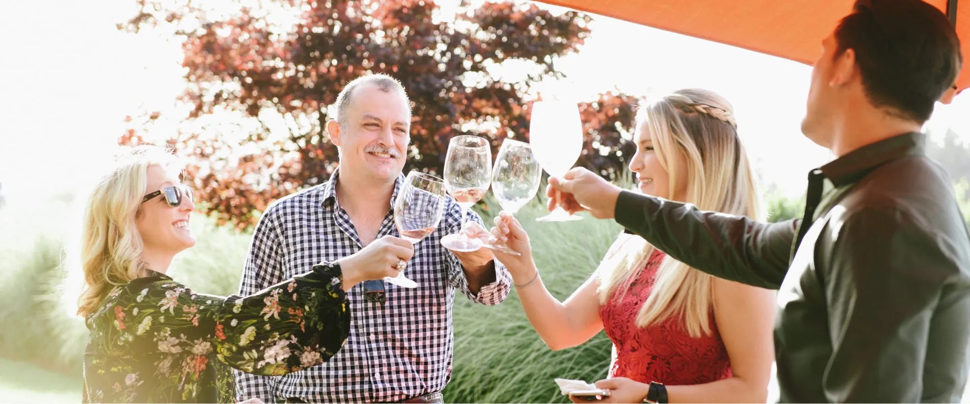 Group of people toasting Rodney Strong Wine