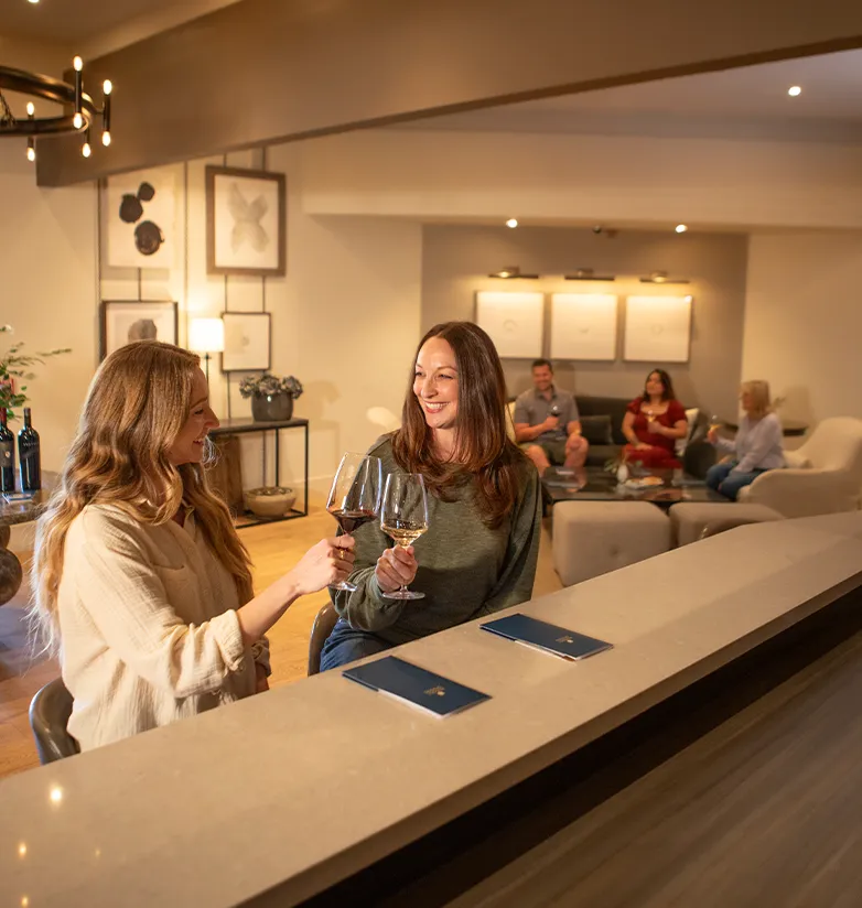 People enjoying wine in the tasting room