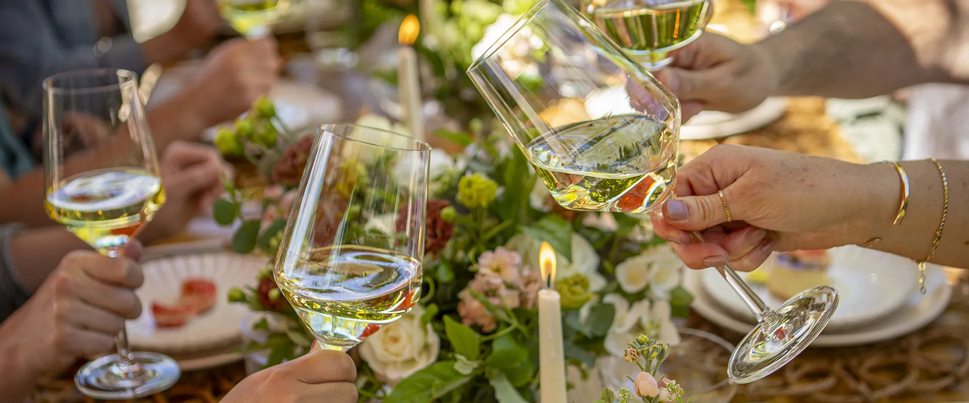 People toasting at a group dinner